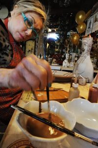 Irma Starr creates her works in the slipware tradition, which involves painting with clay that has been thinned with water and tinted with mineral oxides.